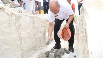 Bupati Taput Melaksanakan Peletakan Batu Pertama Unit Sekolah Baru SMA Negeri 2 Pangaribuan